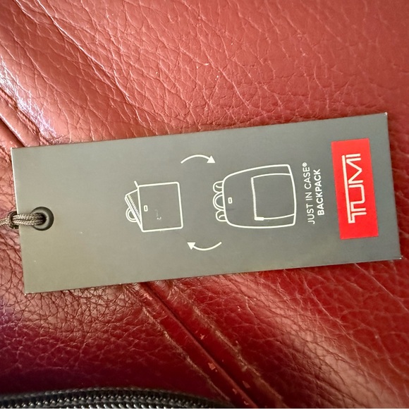 Tumi Black Backpack with Gold Accents - Picture 4 of 5